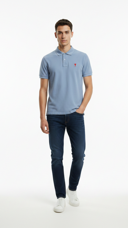 Full body man wearing light blue polo