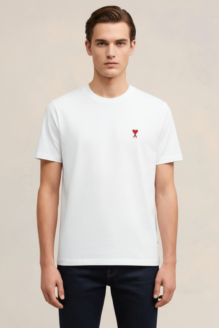 Man wearing white t-shirt with red heart logo
